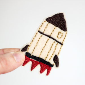 Aufnäher Rakete groß gestreift von Halfbird