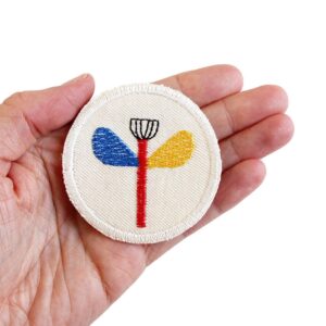 Aufnäher rund 'Blume' von Halfbird